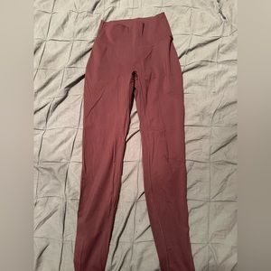 Paragon leggings. Burgundy. Size medium.
